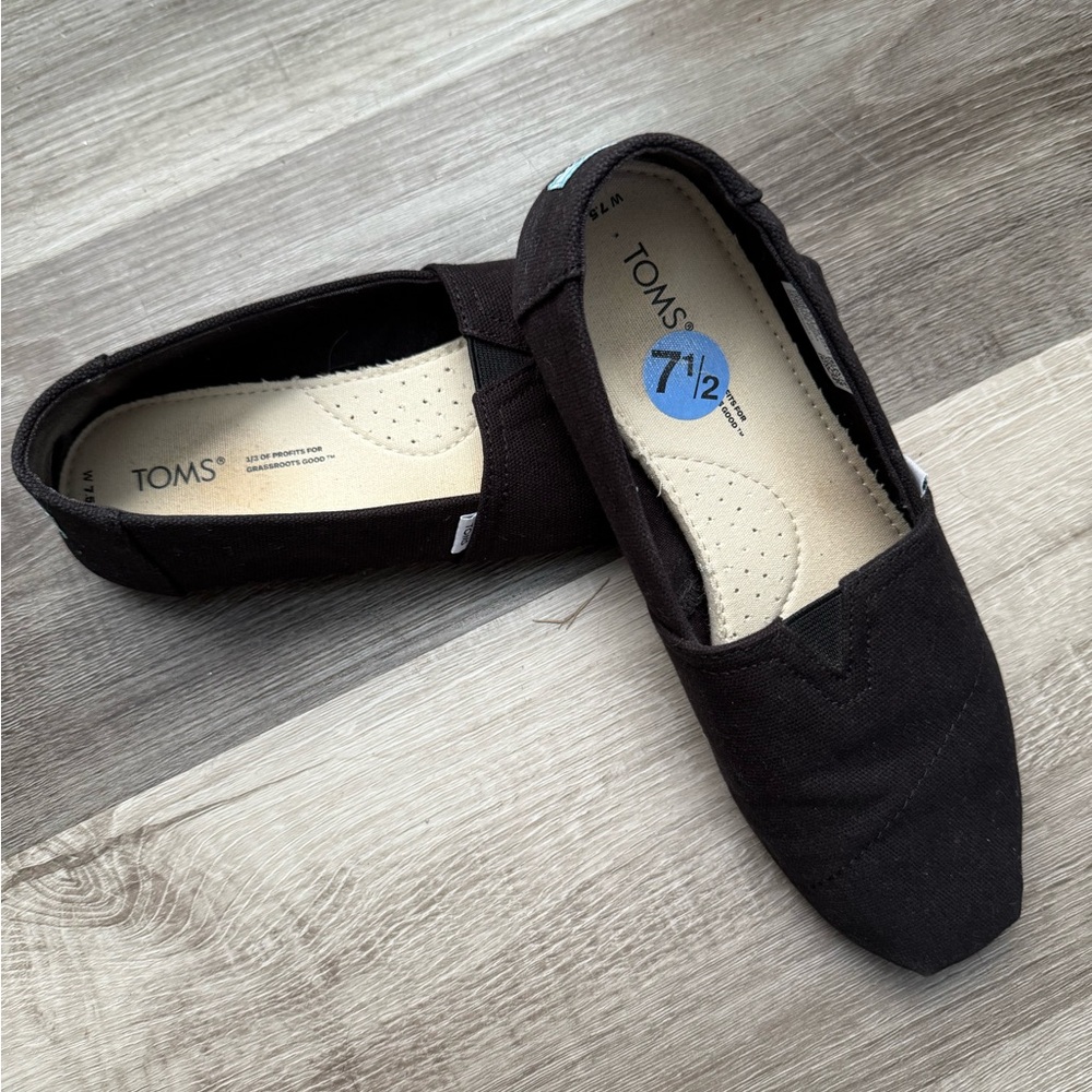 TOMS Classic Black Canvas Slip-Ons